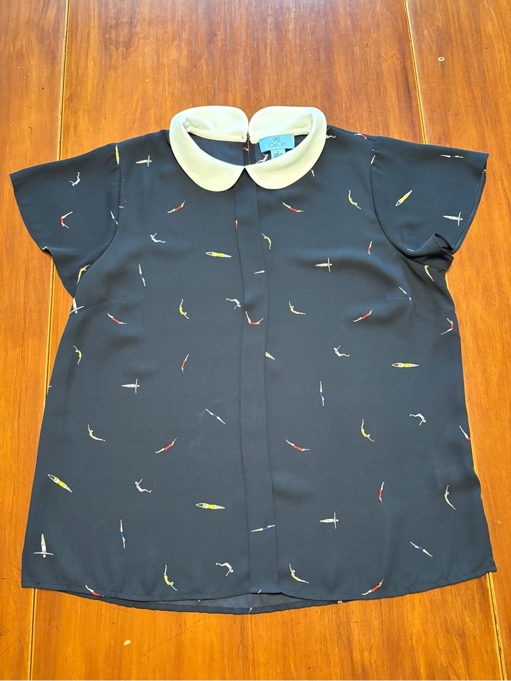 CeCe Navy Blouse with White Peter Pan Collar and Kayak Print